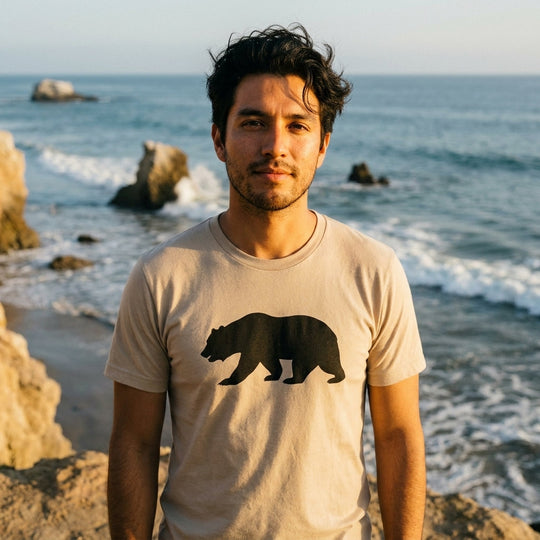 California Bear Tee worn at Malibu El Matador cliff, Bella+Canvas 3001 sand tan, printed on demand by Cali Life Co.