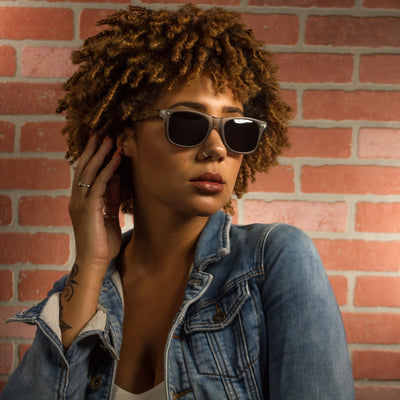 Rockport polarized lens detail showing UV400 tint and optical clarity, bamboo wood frame by Cali Life Co