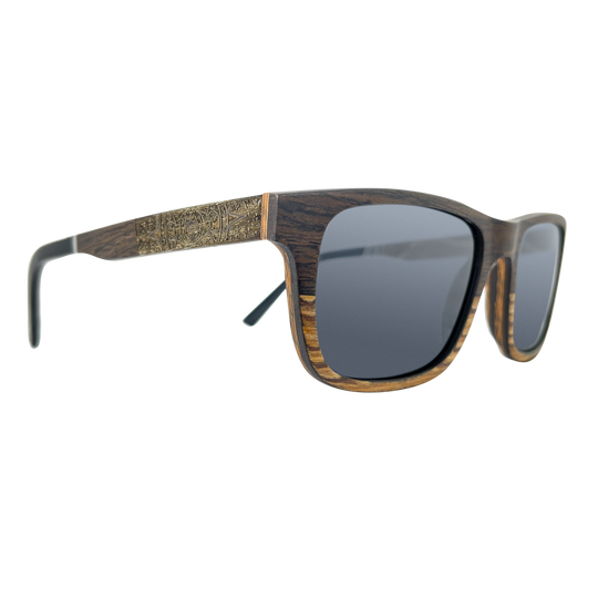 Joshua Tree sunglasses side profile showing real layered walnut and black oak temples and stainless spring hinge, Cali Life Co