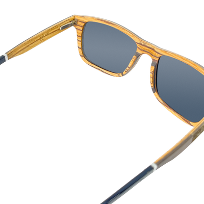 Joshua Tree polarized UV400 sunglasses close-up of stainless spring hinge and temple craftsmanship, Cali Life Co
