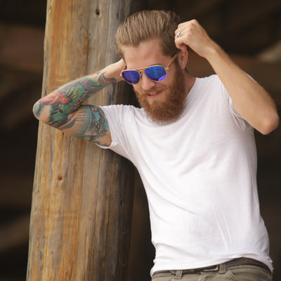 Pacific Beach three-quarter view of walnut wood-temple sunglasses with polarized UV400 lenses, Cali Life Co Coastal