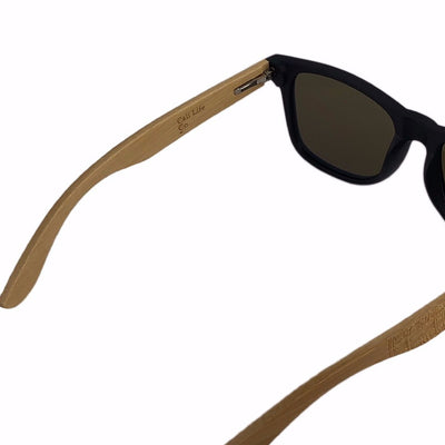 Santa Barbara polarized sunglasses with bamboo wood temples worn in natural light, California Beach Series by Cali Life Co