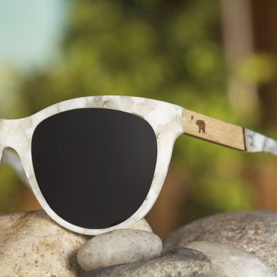 Venice polarized lens detail showing UV400 tint and optical clarity, zebra wood frame by Cali Life Co